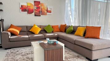 Chalet, 3 Bedrooms, Lagoon View | Living area | Flat-screen TV