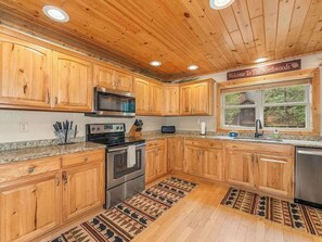 Fridge, microwave, oven, stovetop - Lakefront home with private dock, firepit, playground & lake views (Eagle River)