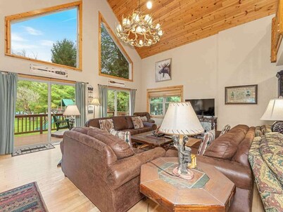 Lakefront home with private dock, firepit, playground & lake views