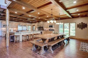 Dining - Luxury lakefront home with high-speed WiFi, dock, private beach, & theater room (Eagle River)