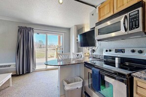 Microwave, oven, stovetop, coffee/tea maker - Ground-floor hotel-style condo with fast WiFi, central AC, & kitchenette (Wisconsin Dells)