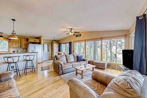 TV, offices - Peaceful river view home with a furnished deck, firepit, central AC, & WiFi (Wisconsin Dells)