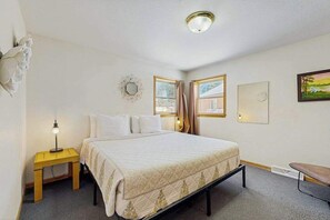 Iron/ironing board, WiFi, bed sheets - Lakefront condo with beach access, firepit, games, fireplace, & dock (Wisconsin Dells)