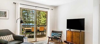 Modern lakefront home with private dock, AC, kayaks, canoe & screened porch