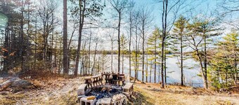 Quiet lakefront home with dock, canoe, & sunroom - dog-friendly