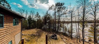 Quiet lakefront home with dock, canoe, & sunroom - dog-friendly