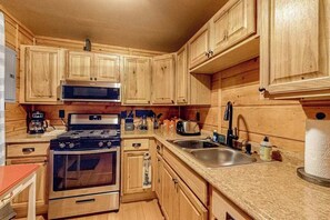 Fridge, microwave, oven, stovetop - Lakeside cabin with a firepit, sunroom, & seasonal dock (Three Lakes)