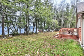 Property grounds - Dog-friendly lakefront cottage with private dock, firepit, grill & washer/dryer (Three Lakes)
