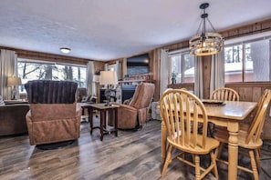 Dining - Snowy lake-view cabin with fireplace, full kitchen, TV, dock, & DVD player (St. Germain)
