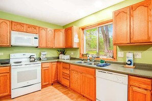Fridge, microwave, oven, stovetop - Dog-friendly, lakefront retreat with a deck, gas grill, & washer/dryer (Phelps)