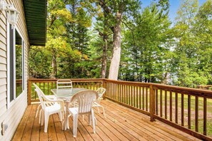 Outdoor dining - Dog-friendly, lakefront retreat with a deck, gas grill, & washer/dryer (Phelps)