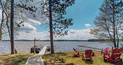 Rustic Cozy lakefront Cabin with dock, fire pit, gas grill, W/D & quiet location