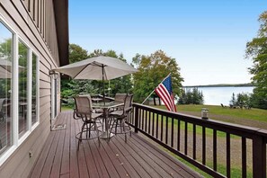 Outdoor dining - Newly remodeled lake home w/panoramic views & private swimming area (Presque Isle)