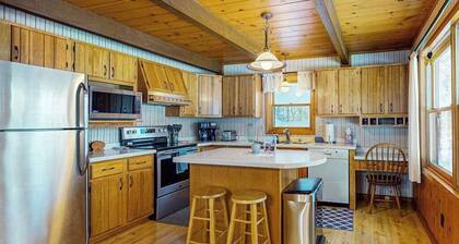 Cozy wooded home w/ access to snowmobile trail, near town, lakes, & bike trails