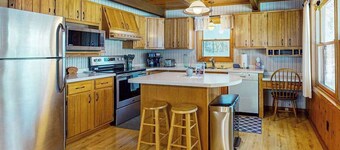 Cozy wooded home w/ access to snowmobile trail, near town, lakes, & bike trails