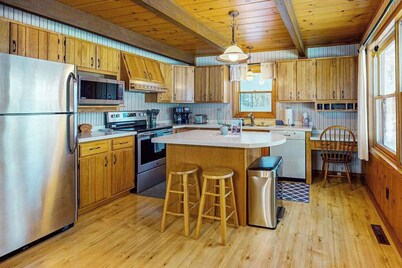 Cozy wooded home w/ access to snowmobile trail, near town, lakes, & bike trails