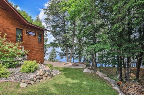 History-filled lakefront home with dock, fire pit, fireplace, & kayaks - dogs OK