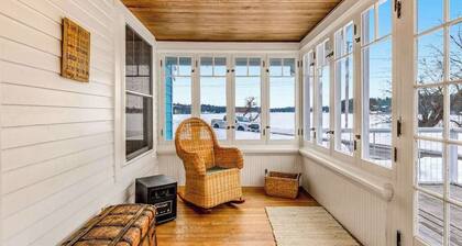 Charming lakefront home with shared dock, porch, & sunroom - walk downtown