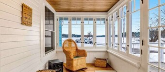 Charming lakefront home with shared dock, porch, & sunroom - walk downtown