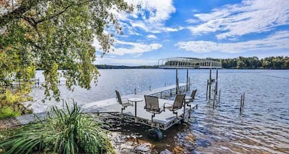 Charming lakefront home with shared dock, porch, & sunroom - walk downtown