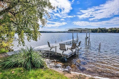 Charming lakefront home with shared dock, porch, & sunroom - walk downtown