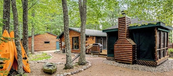Lakefront log cabin on 3.5 acres with dock, gazebo & sunset views - dog-friendly