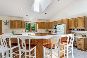 Fridge, microwave, oven, stovetop - Lakefront, Dog-Friendly Home with Lake View, Dock, Central AC, & Wood Fireplace (Manitowish Waters)