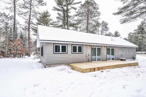 Exterior - Updated, tree-lined home on the snowmobile trail with gas fireplace & firepit (Manitowish Waters)
