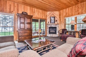TV, fireplace - Lake resort villa with water views, screened porch & marina - dog-friendly (Manitowish Waters)