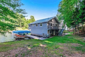 Exterior - Dog-friendly, lakefront getaway w/ a wraparound balcony, beach, & boat access (Manitowish Waters)