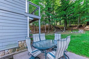 Outdoor dining - Dog-friendly, lakefront getaway w/ a wraparound balcony, beach, & boat access (Manitowish Waters)