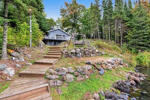 Property grounds - Spacious lakefront home with pier views, canoe, and fire pit - family-friendly (Land O'Lakes)