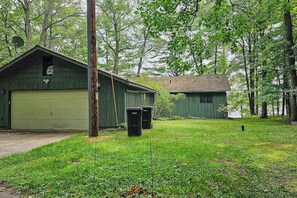 Exterior - Waterfront home between 2 lakes w/ heated porch, dock & kayaks (Manitowish Waters)