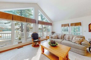 TV, fireplace, table football - Lakefront home with amazing views, water access, foosball, & fireplace (Eagle River)