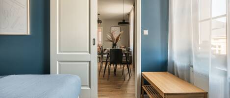 Family Apartment, City View | Desk, laptop workspace, iron/ironing board, free WiFi