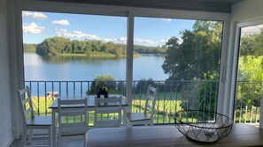 Dining - Holiday Home 'Haus Am See' with Lake View, Private Terrace and Wi-Fi (Stocksee)