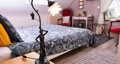 Chambre dâhĂŽtes « La Chambre - Vue Jardin » avec terrasse commune, jardin et Wi-Fi