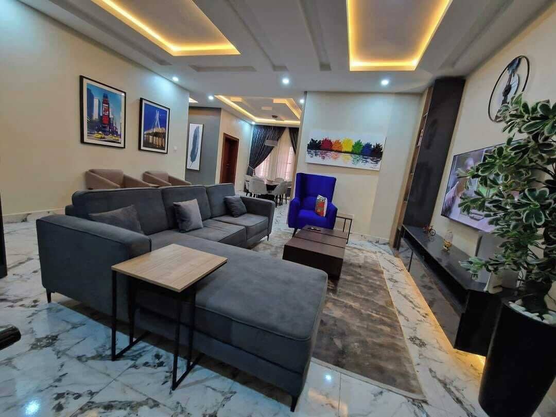 Habitación económica, balcón, vista a la ciudad | Área de sala de estar