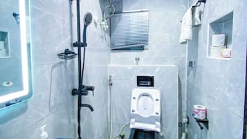 Family Room, Balcony, City View | Bathroom | Free toiletries, hair dryer, towels, soap