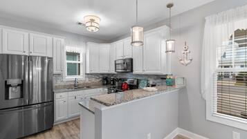 Fridge, oven, stovetop, coffee/tea maker