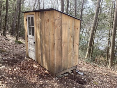 Enjoy fishing and kayaking from waterfront cabin retreat in charming Woodstock