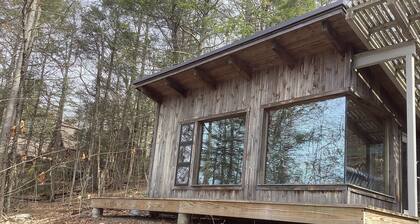 Enjoy fishing and kayaking from waterfront cabin retreat in charming Woodstock