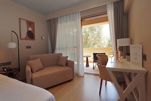 Ionian Executive Garden View Room | Minibar, in-room safe, laptop workspace, iron/ironing board