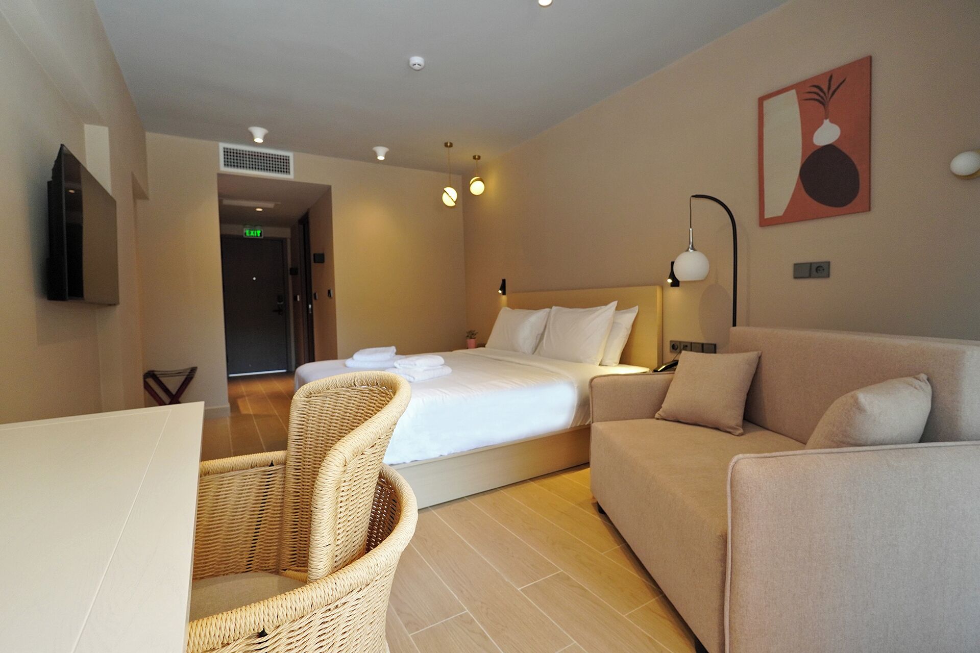 Ionian Executive Garden View Room | Minibar, in-room safe, laptop workspace, iron/ironing board