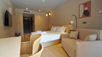 Ionian Executive Garden View Room | Minibar, in-room safe, laptop workspace, iron/ironing board