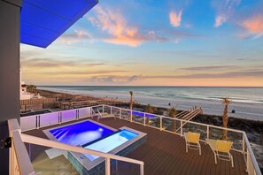 A pool area with a view of the beach and ocean. - Page's Retreat|Gulf Front| Private Pool|Golf Cart (Panama City Beach)
