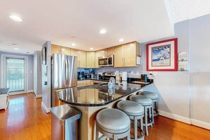 Fridge, microwave, oven, stovetop - Town of Dewey Beach updated condo with pool, balcony, & W/D (Dewey Beach)