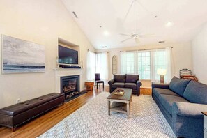 TV, fireplace, offices - Bear Trap Dunes condo with screened porch, deck, pools, saunas & beach shuttle (Ocean View)