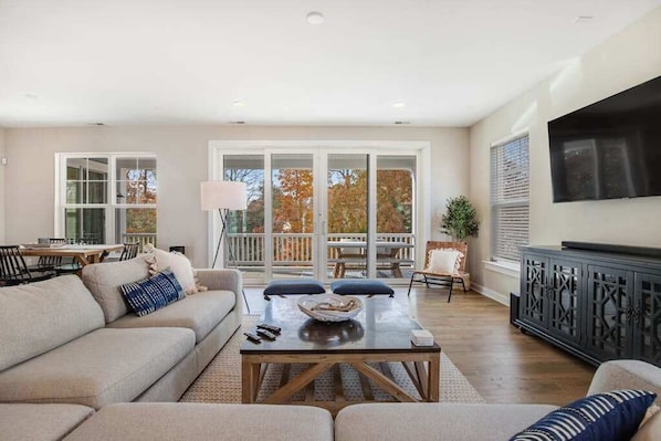 TV, offices - Luxe New Home in Tidal Walk - 2 Decks, Home Office, Dogs OK, AC & Shared Pool (Ocean View)