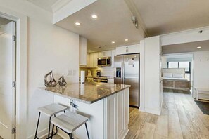 Fridge, microwave, oven, stovetop - Sea Colony Ocean renovated beachfront condo with balcony, AC, pools, & tennis (Bethany Beach)